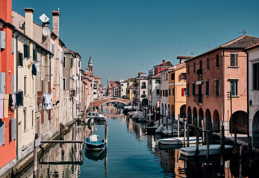Chioggia canal in the Venetian Lagoon on a cycling tour in Italy