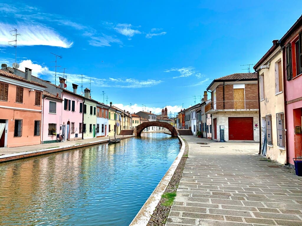 Comacchio canal and bridge on a self-guided cycling tour in Italy
