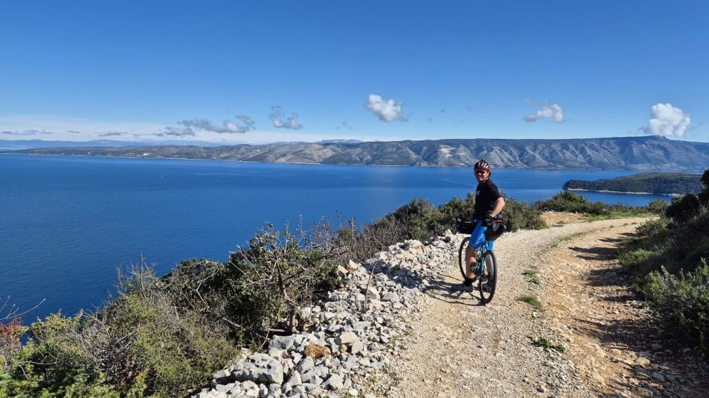 Cycling tour on Hvar Island with scenic Adriatic Sea views in Dalmatia, Croatia.
